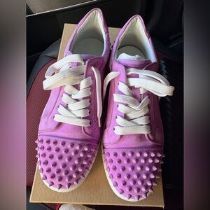 Purple Christian Louboutin for sale wore once perfect condition
